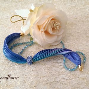 Bracciale di seta e cristalli di swarovski viola e azzurro