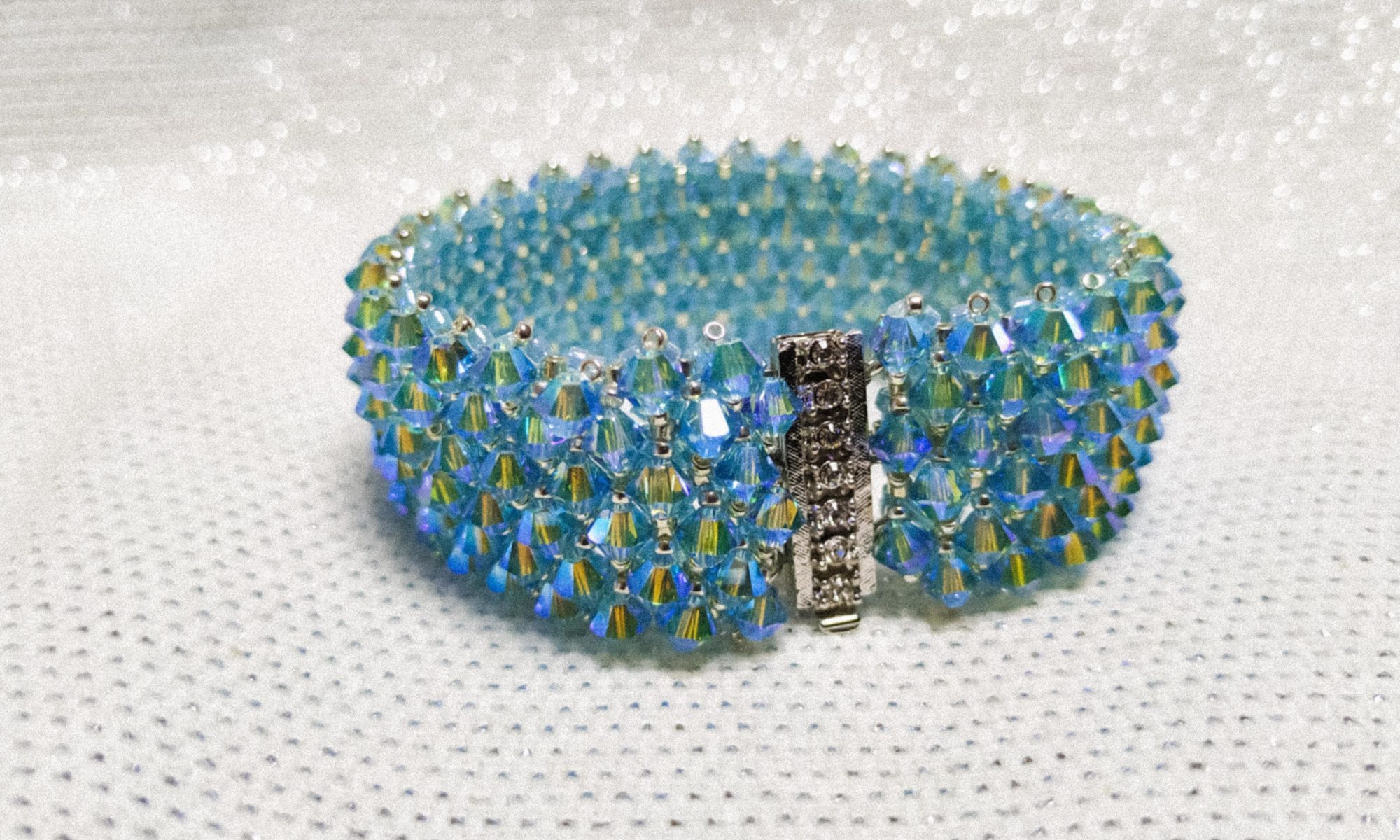 bracciale e orecchini di cristalli azzurro